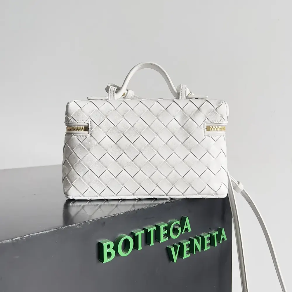Angled shot showing silver-tone hardware and zip on Bottega Veneta Bang Bang Vanity Case-White