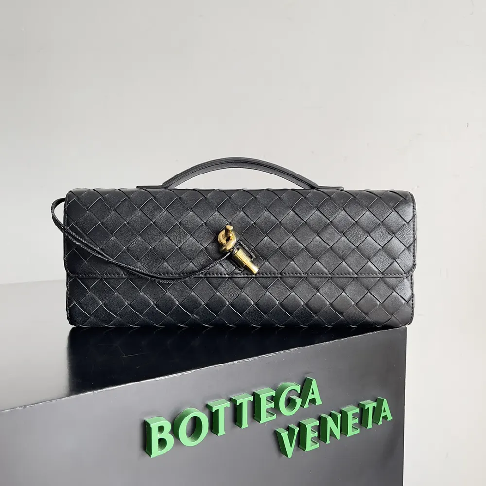 Close-up of intrecciato weave and gold hardware on the clutch