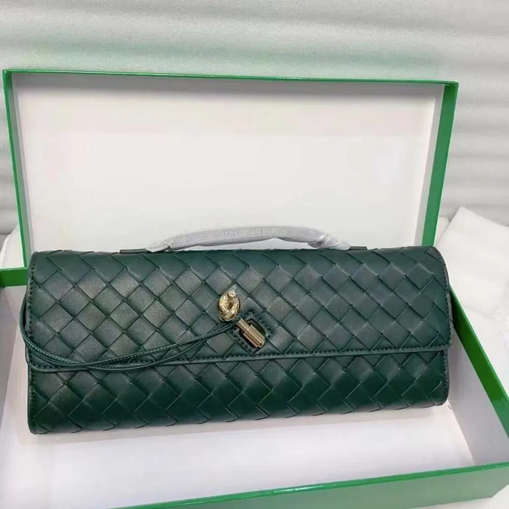 Close-up of intrecciato leather weave on clutch handle detail