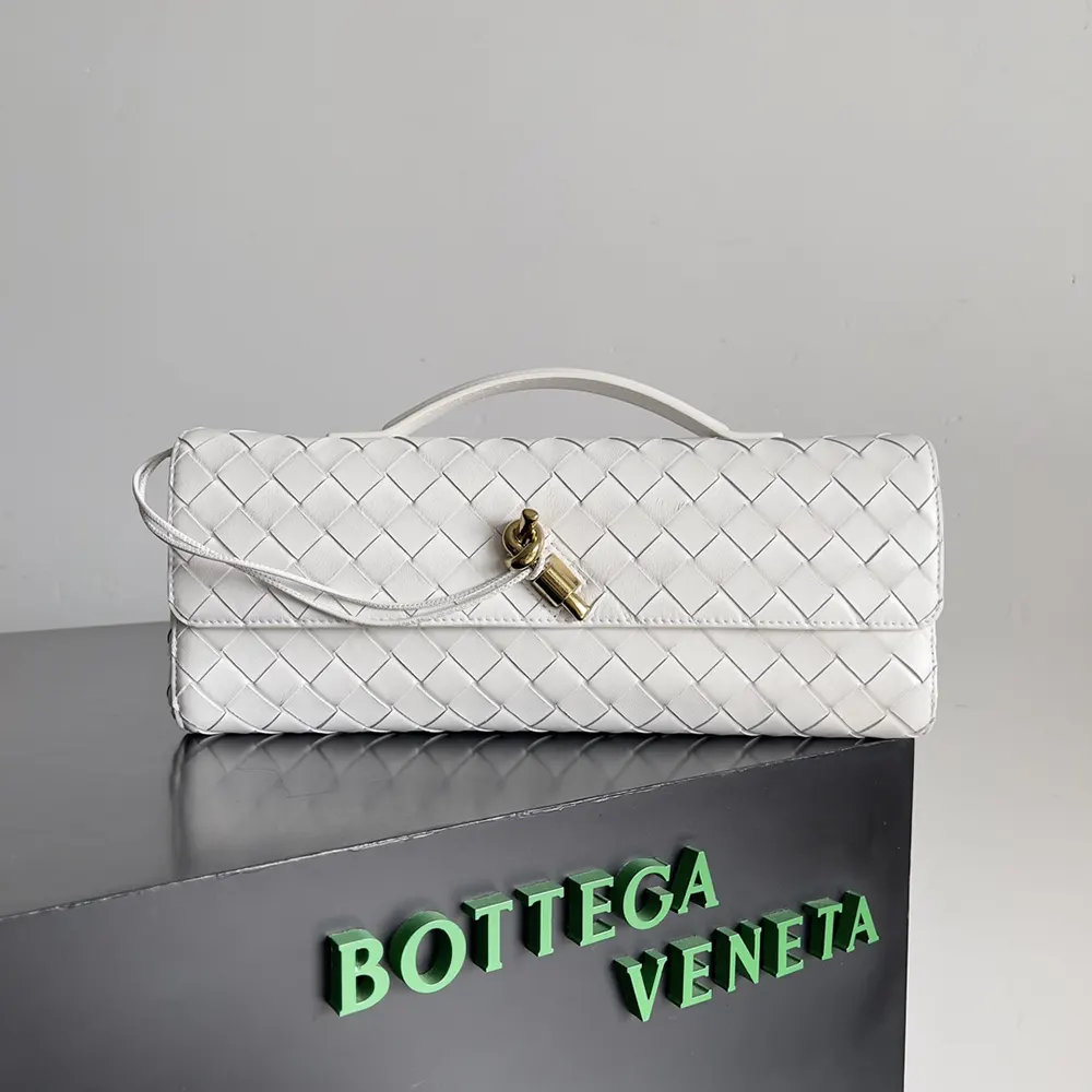 Close-up of white intrecciato leather and silver hardware details