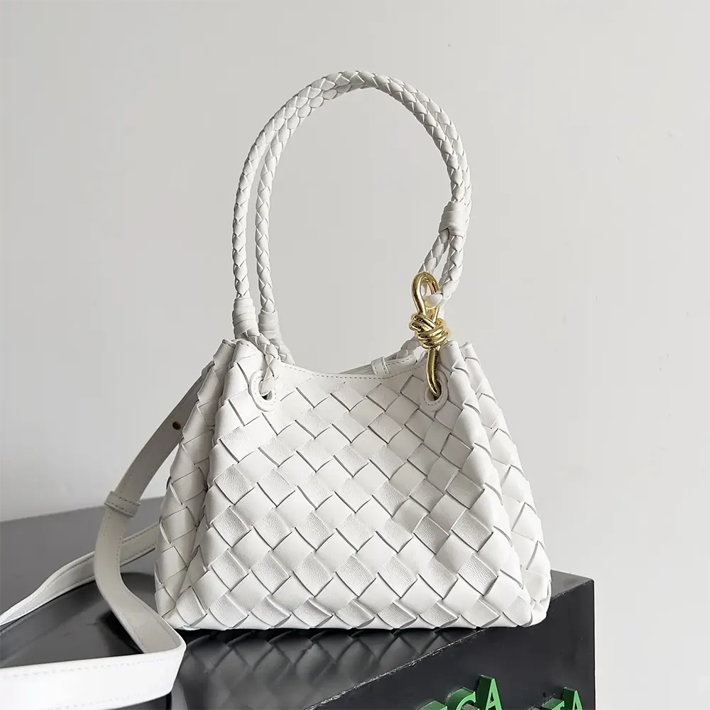 Close-up of intrecciato weave on Bottega Veneta Women Small Andiamo Parachute-White