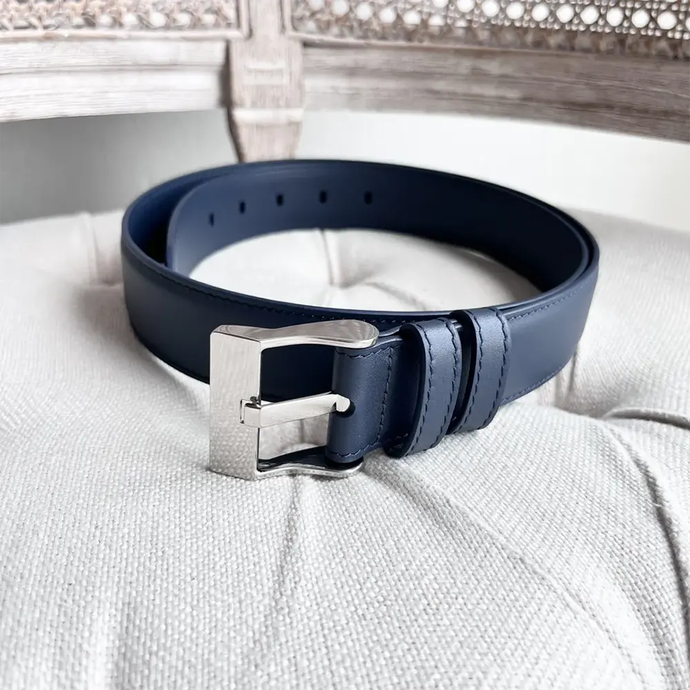 Close-up of navy smooth calfskin texture on Bottega Veneta belt