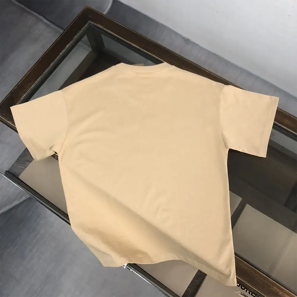 Side angle of Burberry Men Check EKD Cotton T-shirt with soft cotton texture