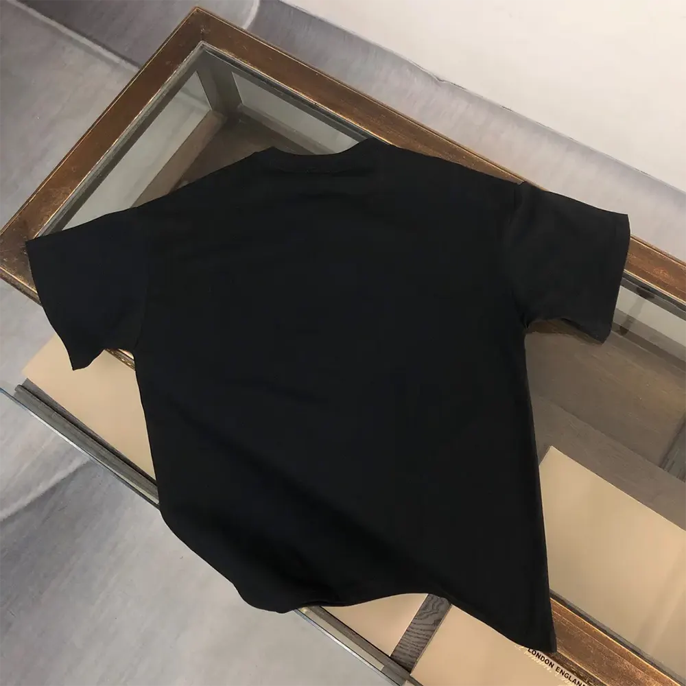 Side angle showing fit of Burberry Men EKD Cotton T-shirt-Black