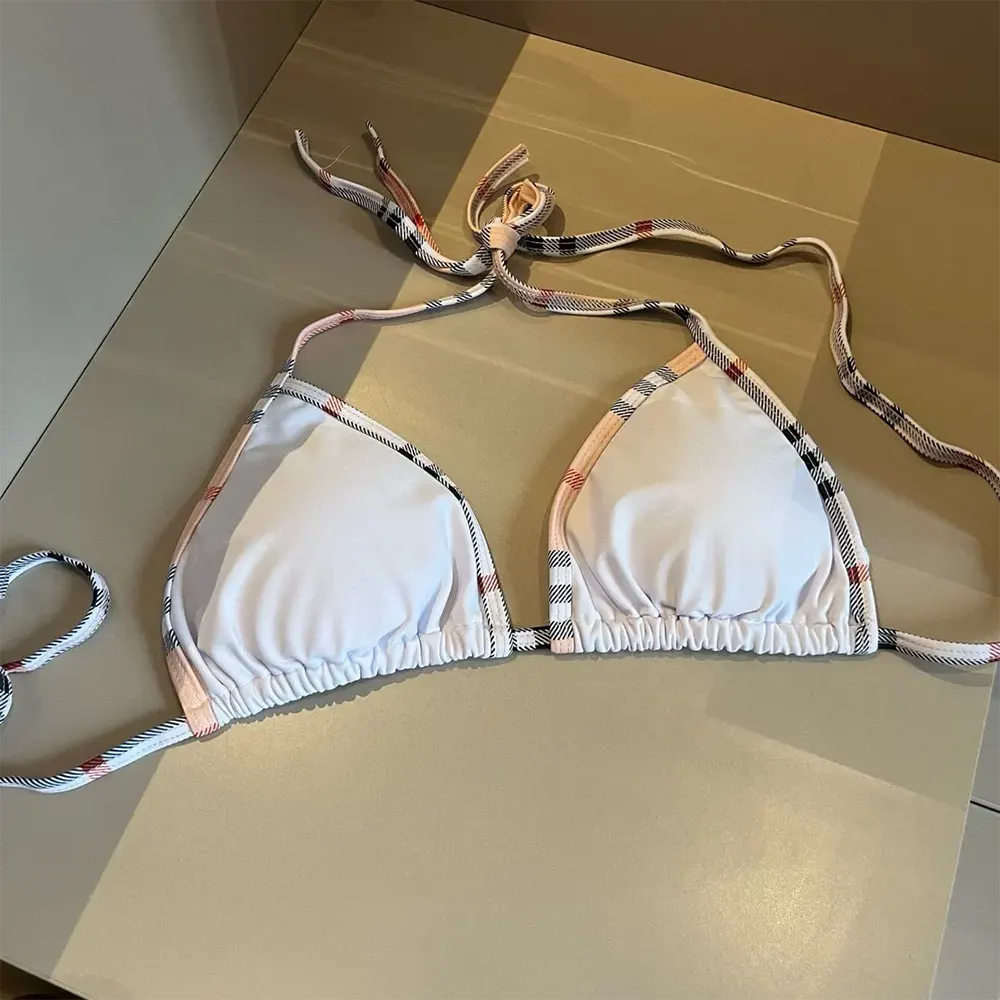 Side angle of Burberry Women Check Trim Bikini-White with adjustable tie closure