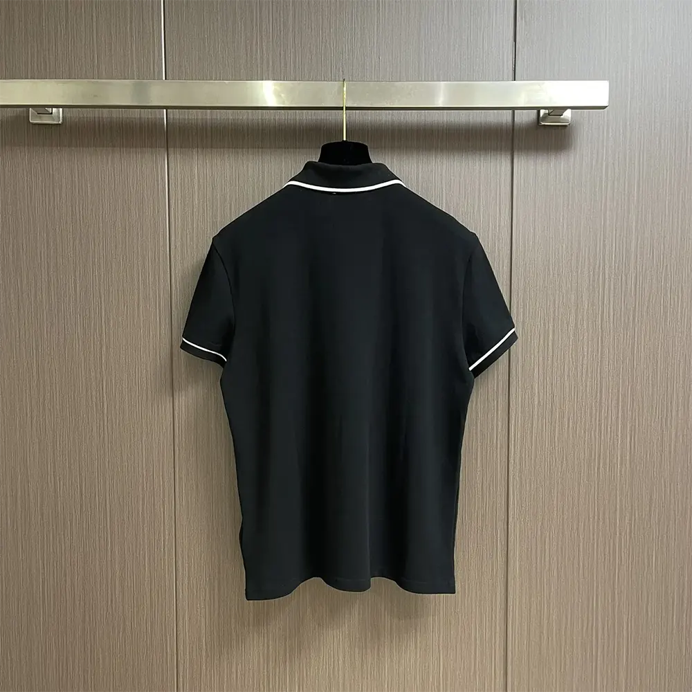 Side angle showing tailored fit of Celine Men Classic Polo Shirt