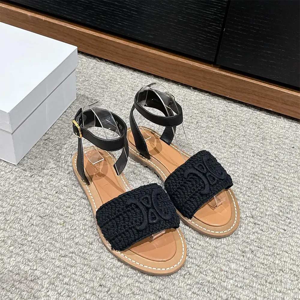 Close-up of signature Triomphe hardware on Celine Women Lympia Sandal black