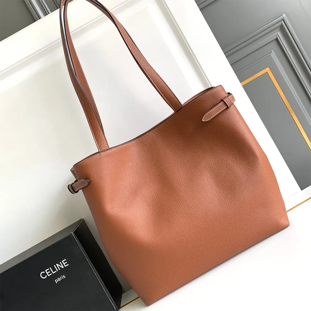 Side angle showing structured silhouette of Celine Women Medium Cabas Anaïs handbag