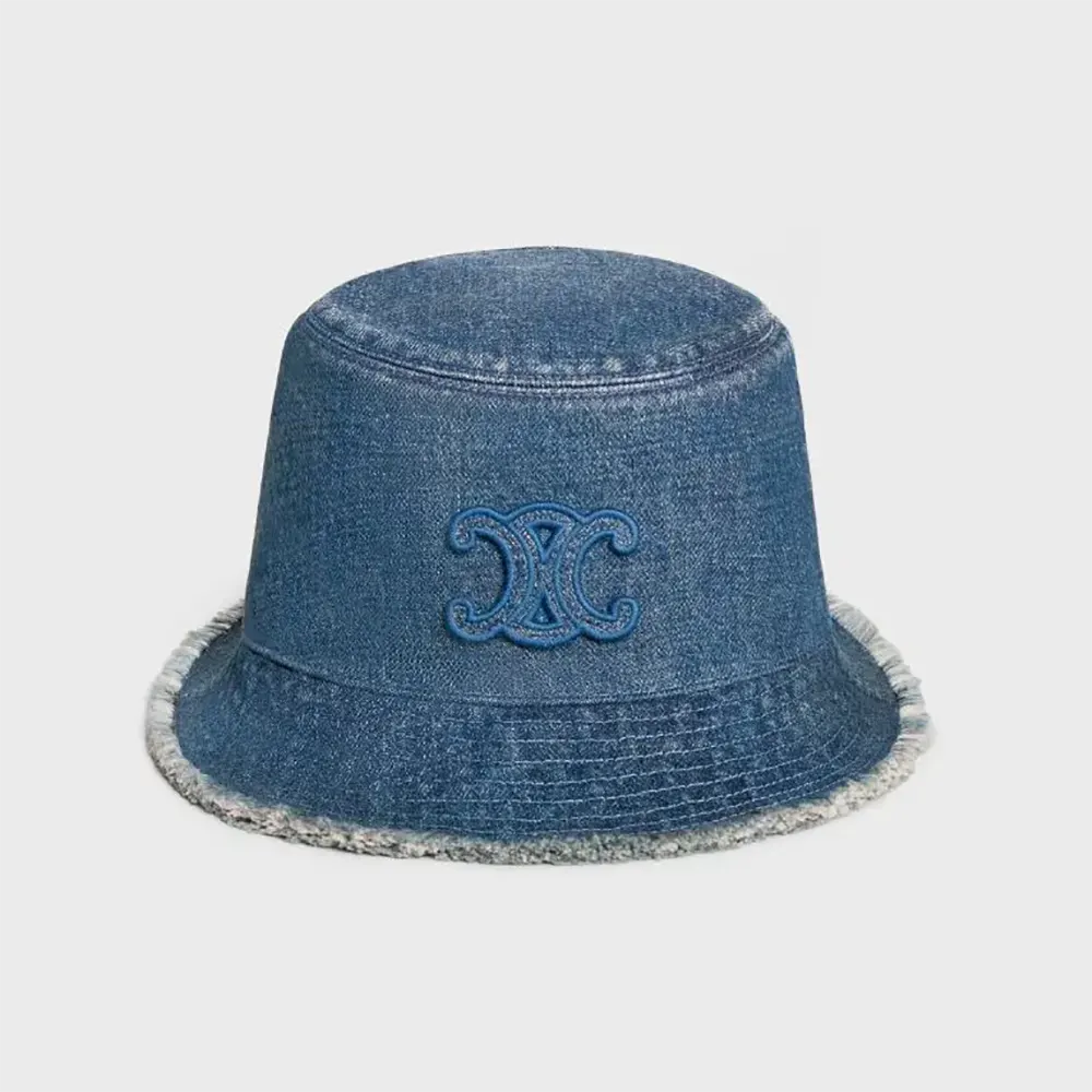 Front angle of Celine Women Triomphe Bucket Hat in Dark Union Wash Denim