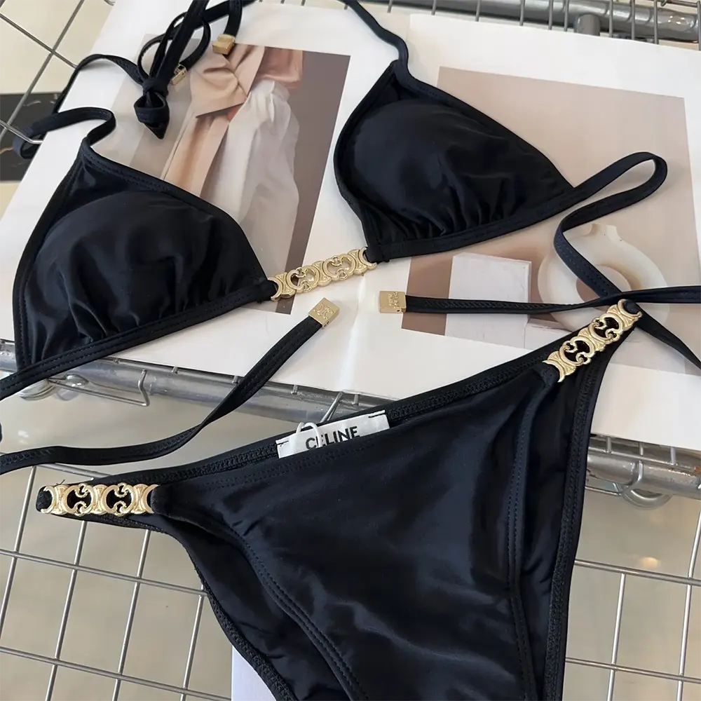 Side angle highlighting black matte jersey fabric on Celine swimsuit