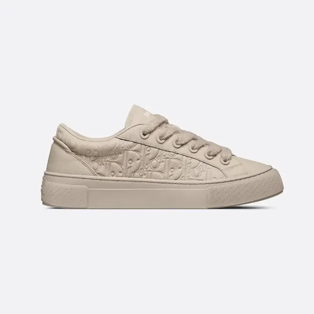 Side profile of Dior Men B33 Sneaker Beige Grained Calfskin and Dior Gravity Leather