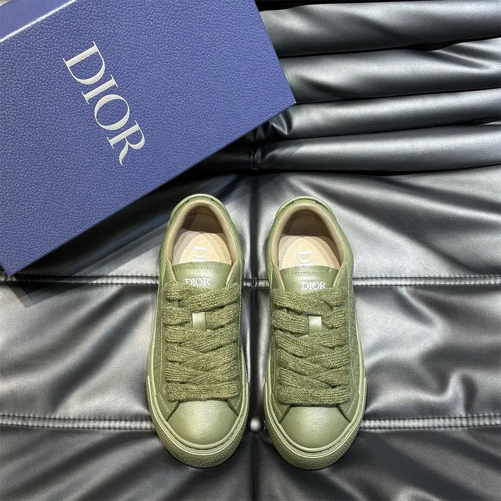 Close-up of grained calfskin and Dior Gravity leather detailing