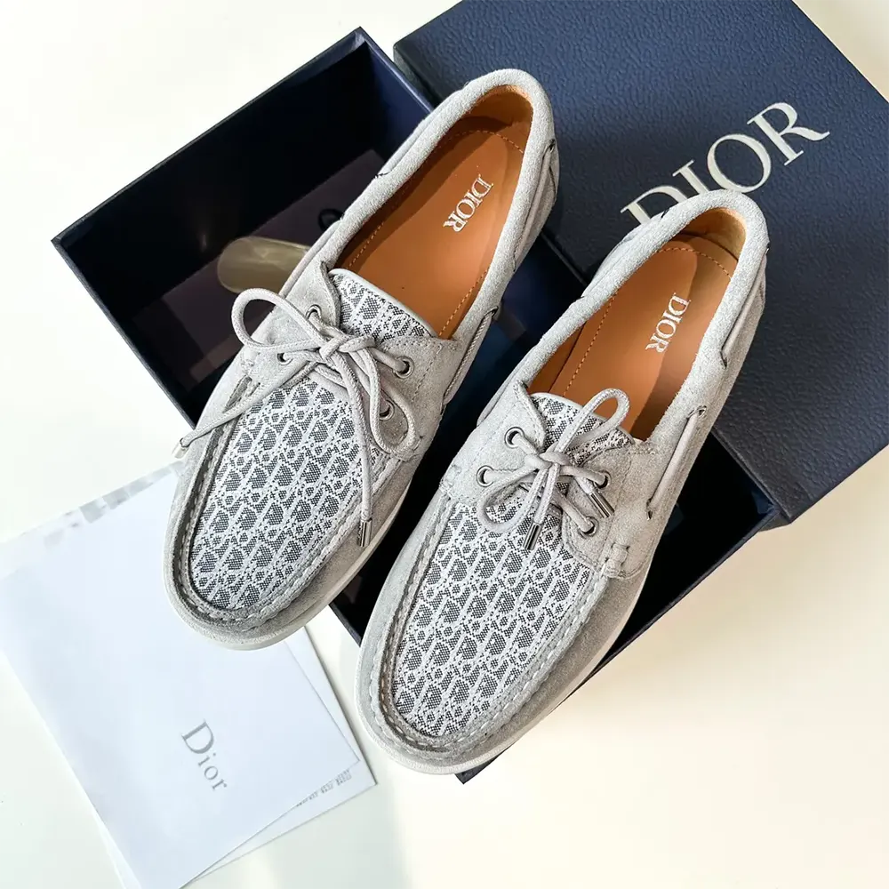 Close-up of gray suede and Dior Oblique jacquard texture on Dior Men Granville Boat Shoe