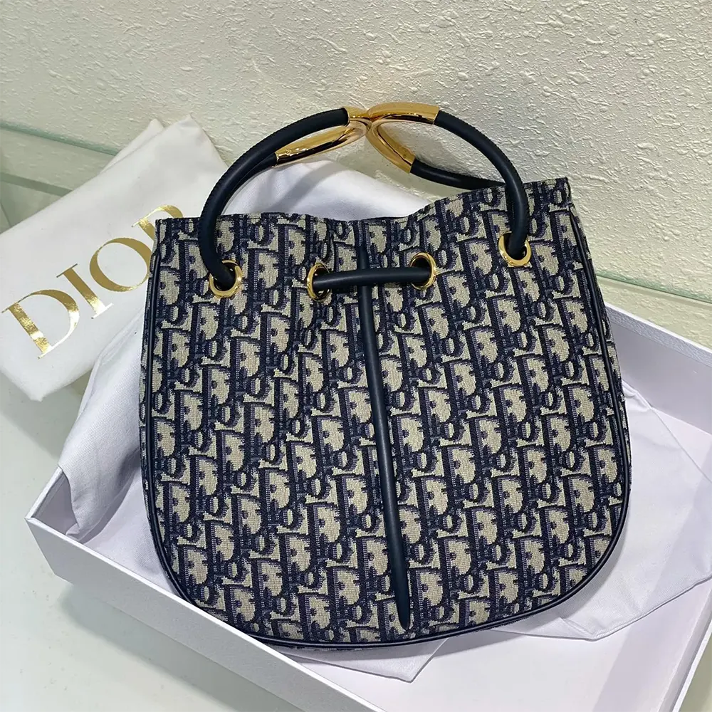 Close-up of silver hardware on Dior Women Medium Dior Nolita Bag