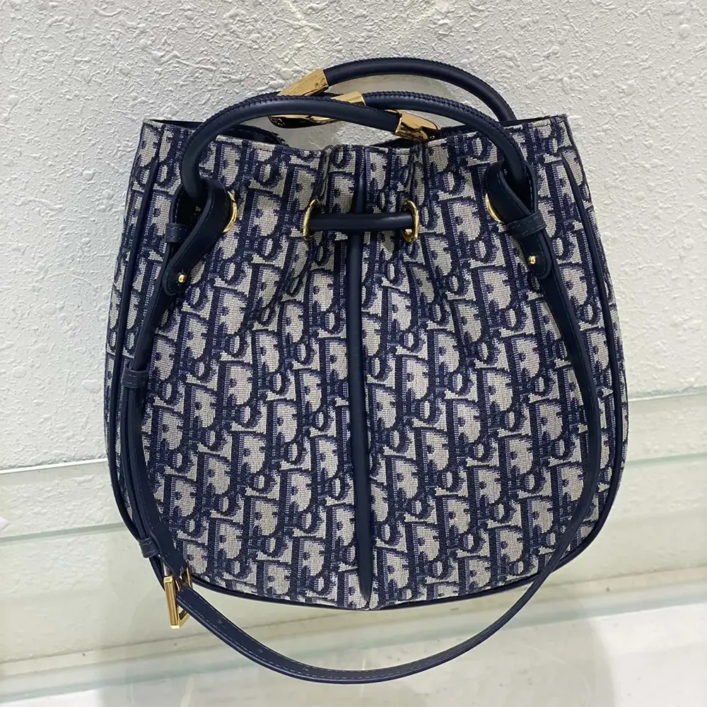 Side angle showing strap detail of Dior Women Medium Dior Nolita Bag