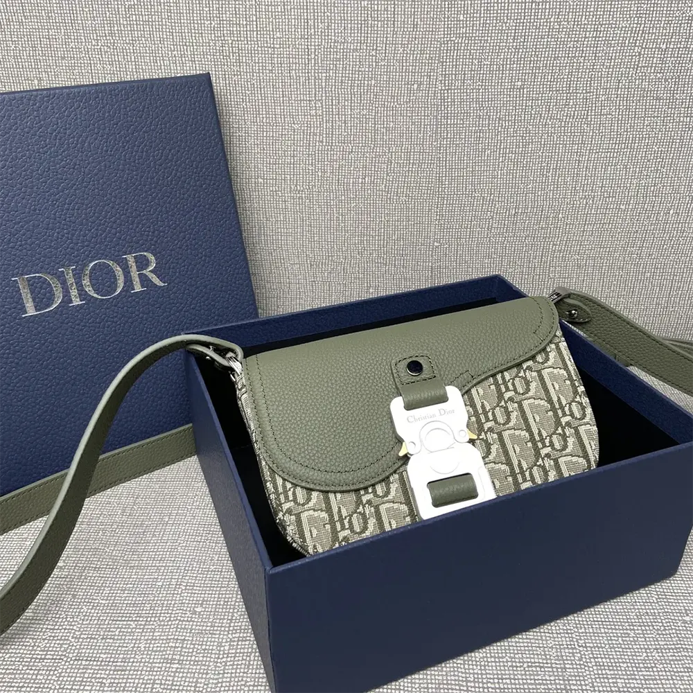 Close-up of flap and silver hardware on Dior Men Mini Saddle Messenger Bag