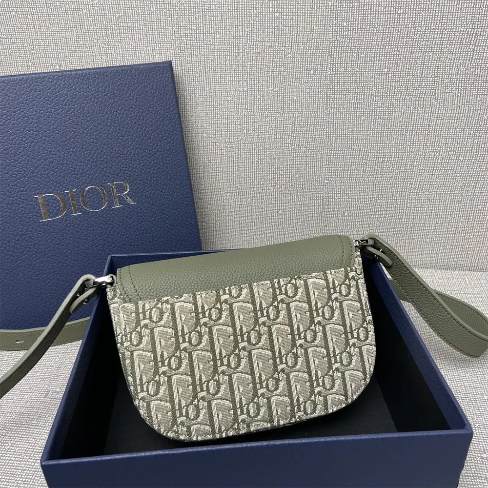 Side view showing adjustable strap on Dior Men Mini Saddle Messenger Bag