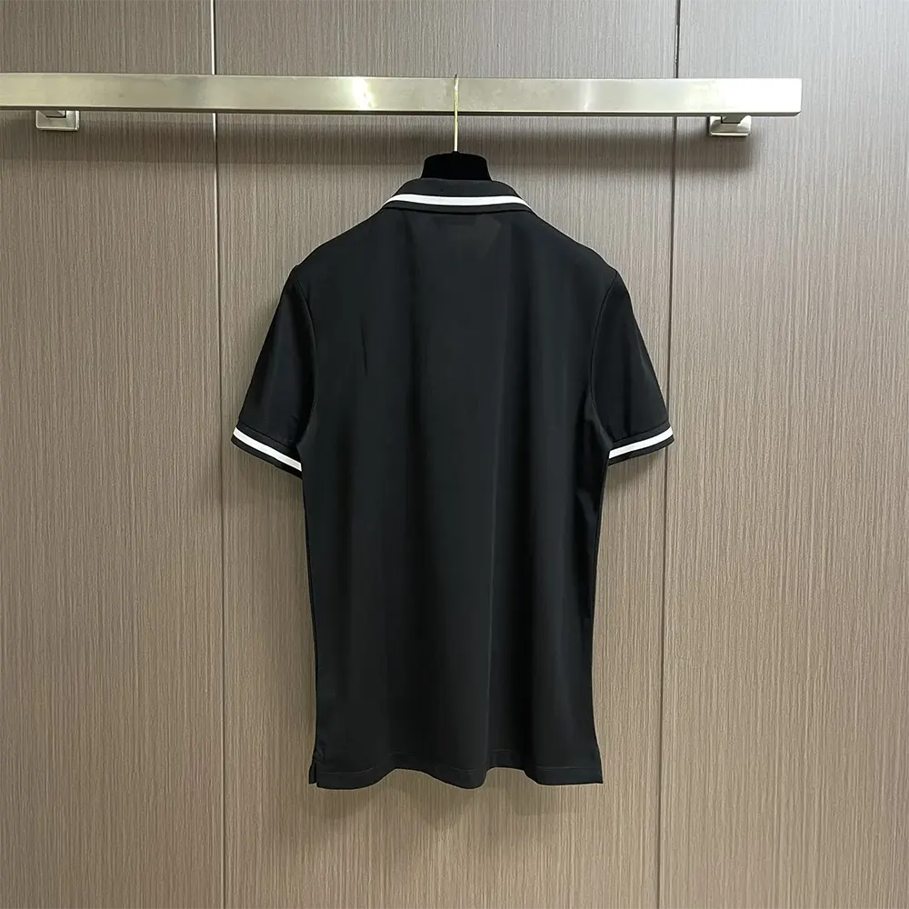 Side angle showing fit and button closure on Dior Men Polo Shirt black