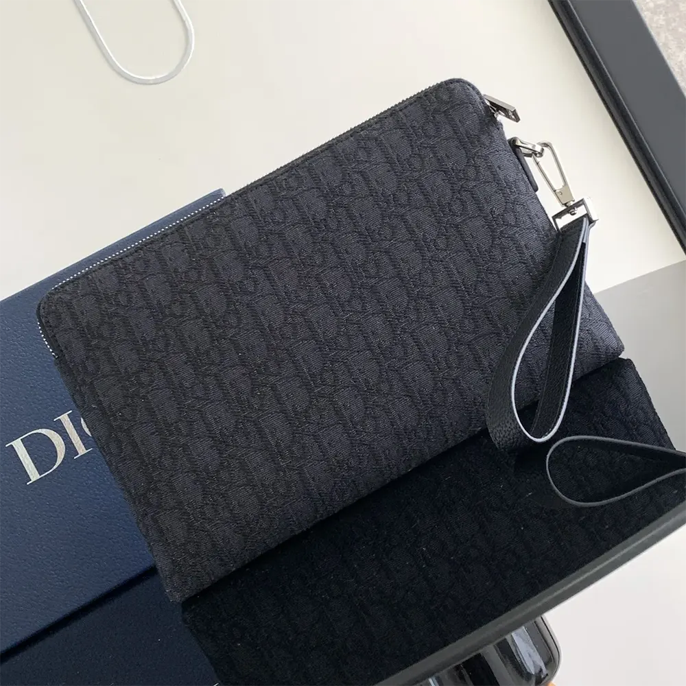 Side angle highlighting slim silhouette of Dior Men Pouch Black Dior Oblique Jacquard