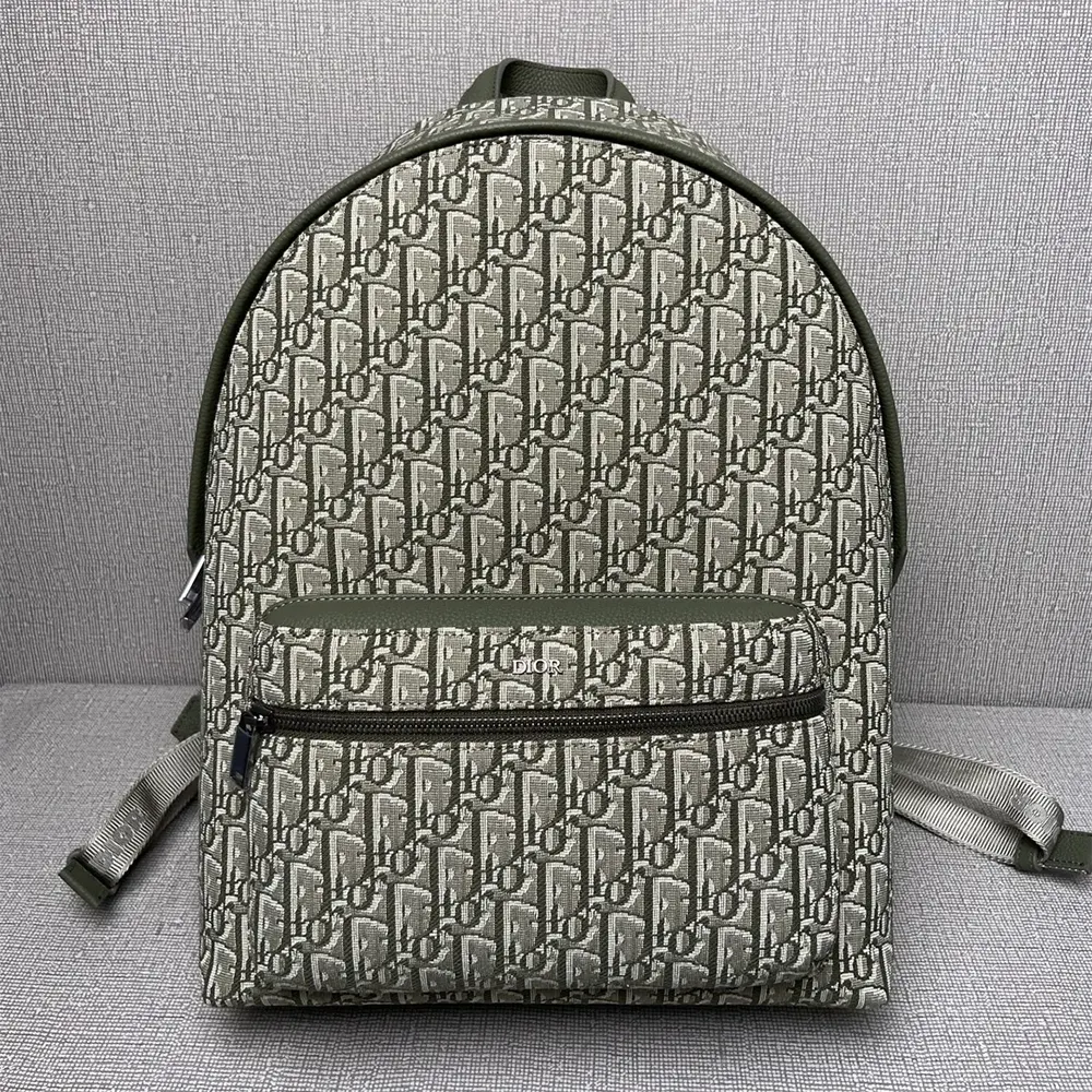 Close-up detail of silver hardware on Dior Men Rider Backpack Khaki