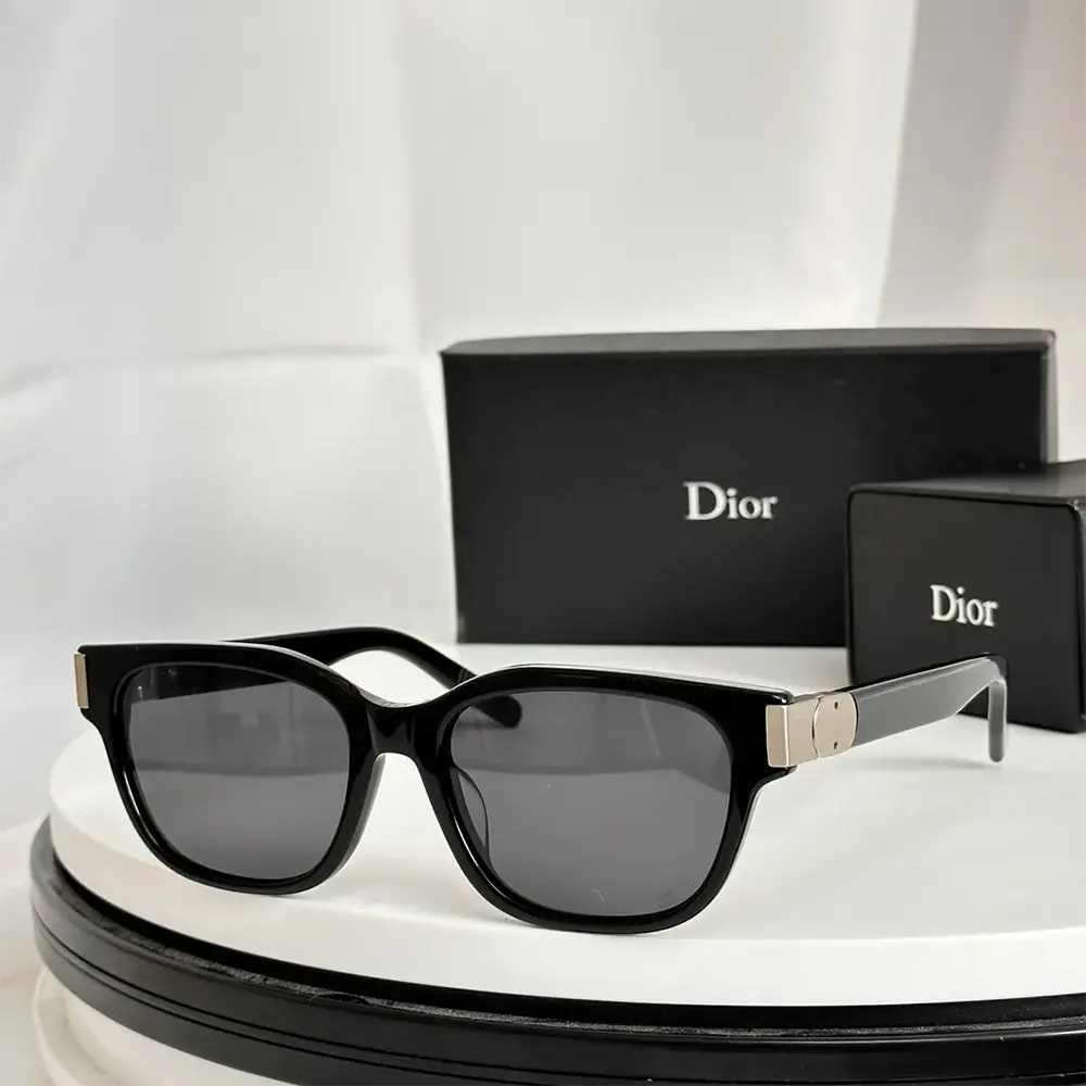 Close-up of Dior logo detail on sunglasses temple arm