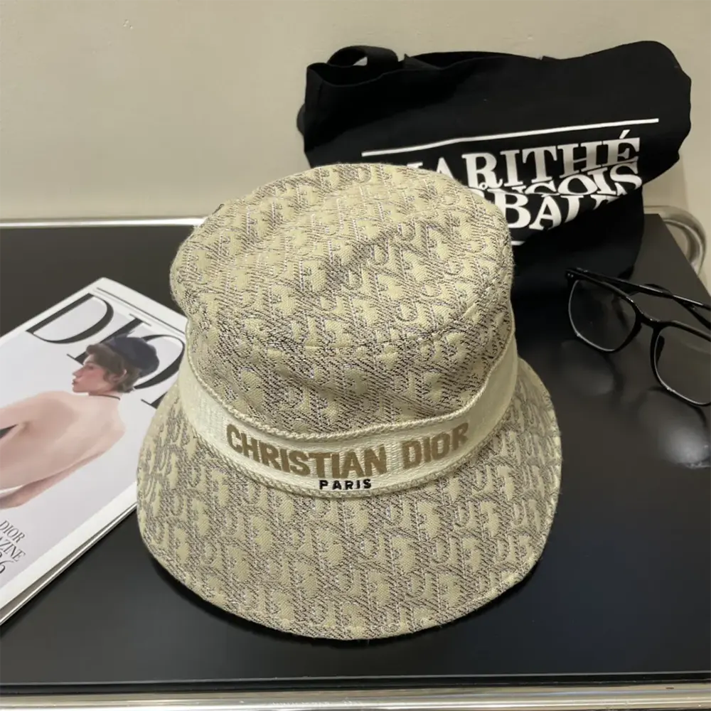 Side profile showing small brim and texture of Dior Unisex D-Bobby bucket hat