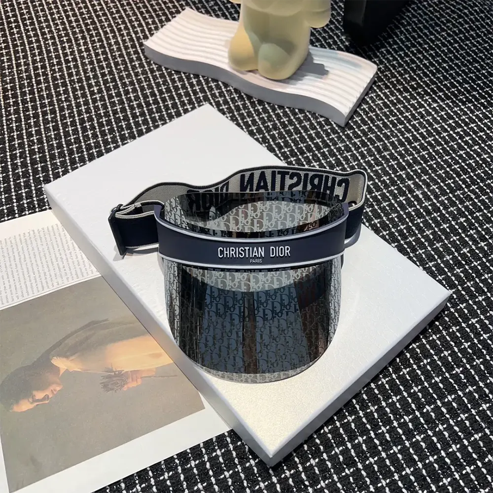 Close-up of blue Dior Oblique pattern on Dior Unisex DiorClub V1U Visor