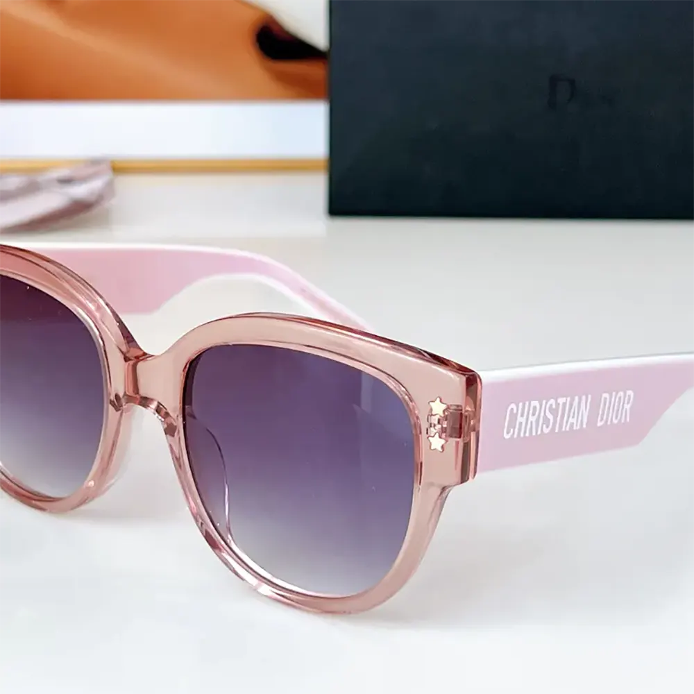 Close-up on silver Dior logo on DiorPacific S2U Lilac sunglasses temple