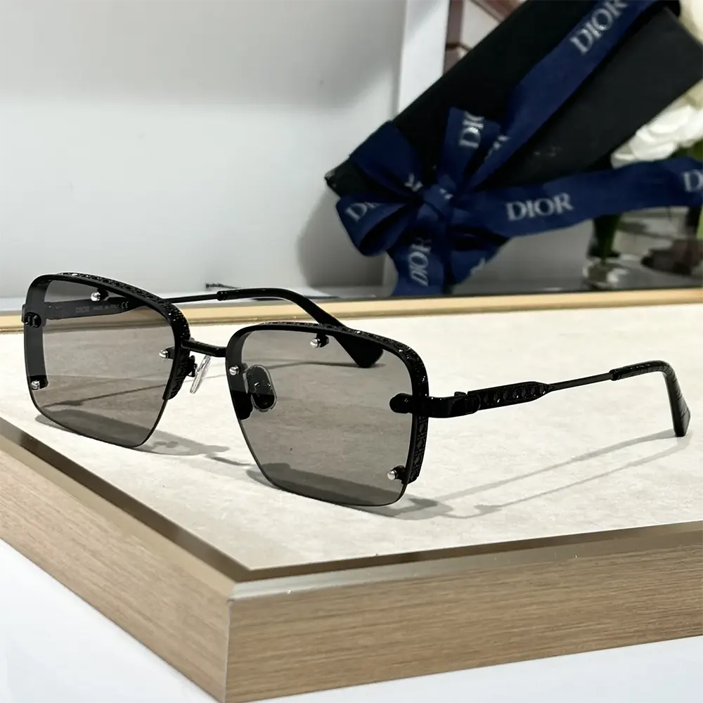 Close-up on silver Dior logo hardware of NeoDior S4U sunglasses
