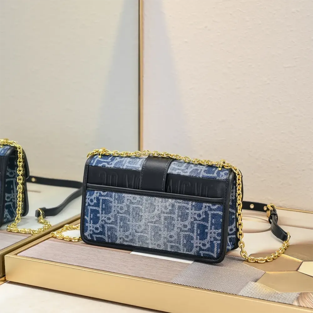 Side angle showing compact silhouette of Dior Women 30 Montaigne East-West Bag