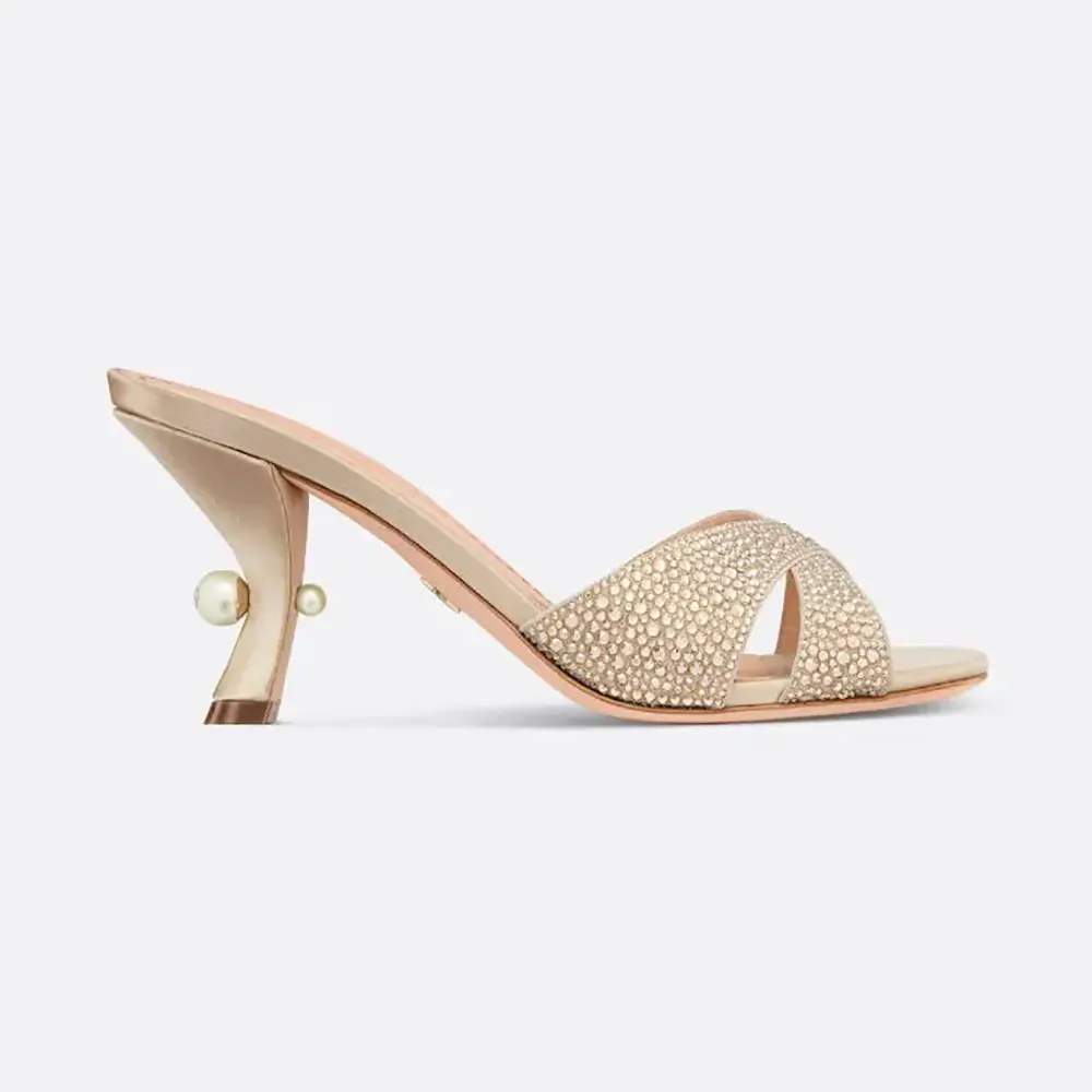Side profile of Dior Women Dior Tribales Heeled Slide in beige suede