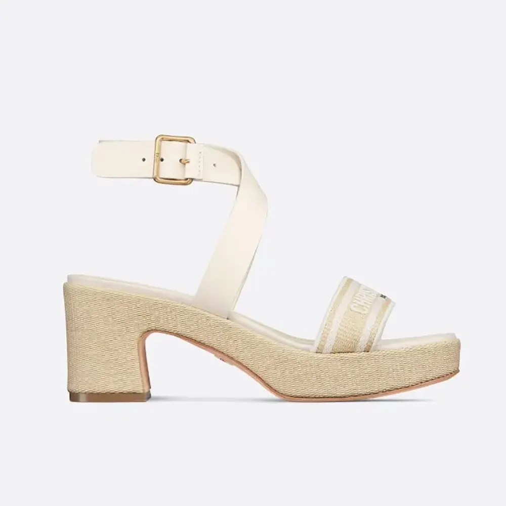 Side profile of Dior Women Dioriviera Dway Heeled Sandal in natural raffia and white calfskin