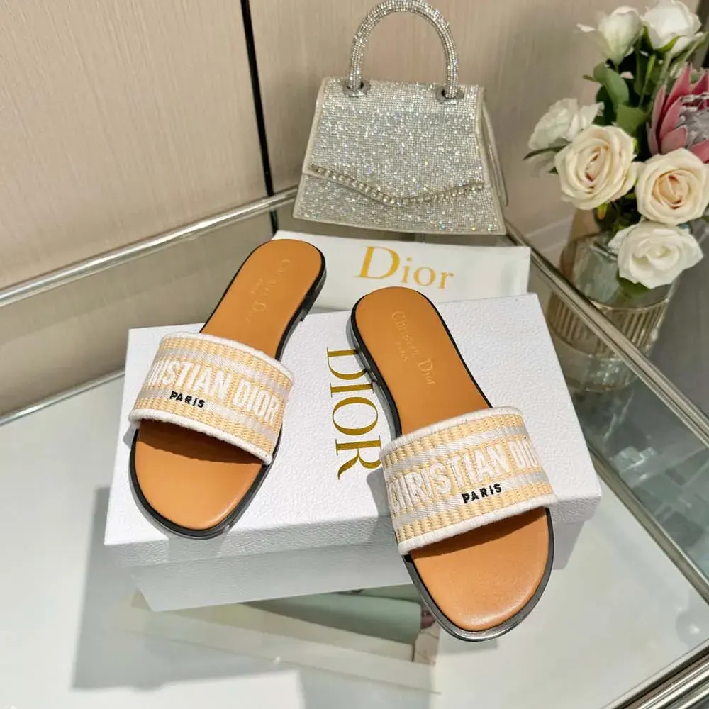 Overhead view showing natural raffia texture on Dior Women Dioriviera Dway Slide