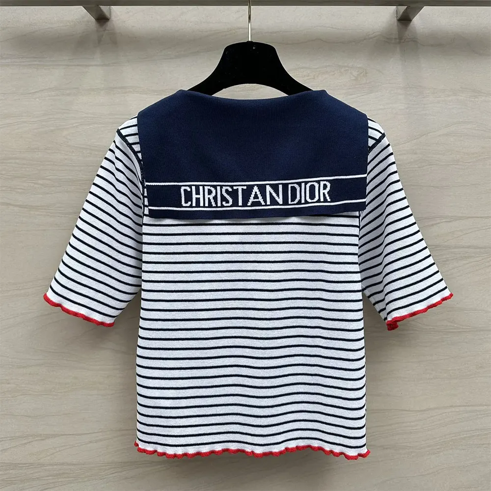 Side angle showing relaxed fit of Dior Women Dioriviera Sweater in navy