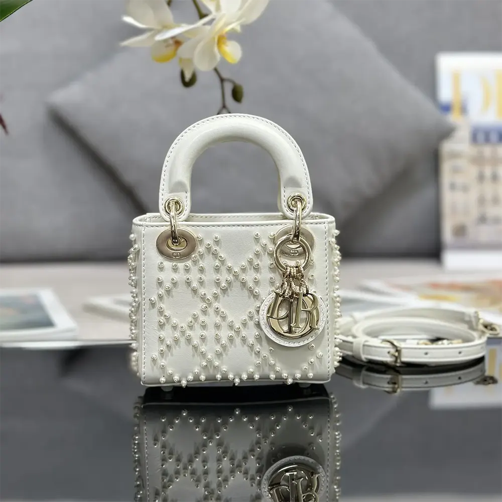Close-up of resin pearl detailing and silver-tone hardware on Lady Dior Micro Bag