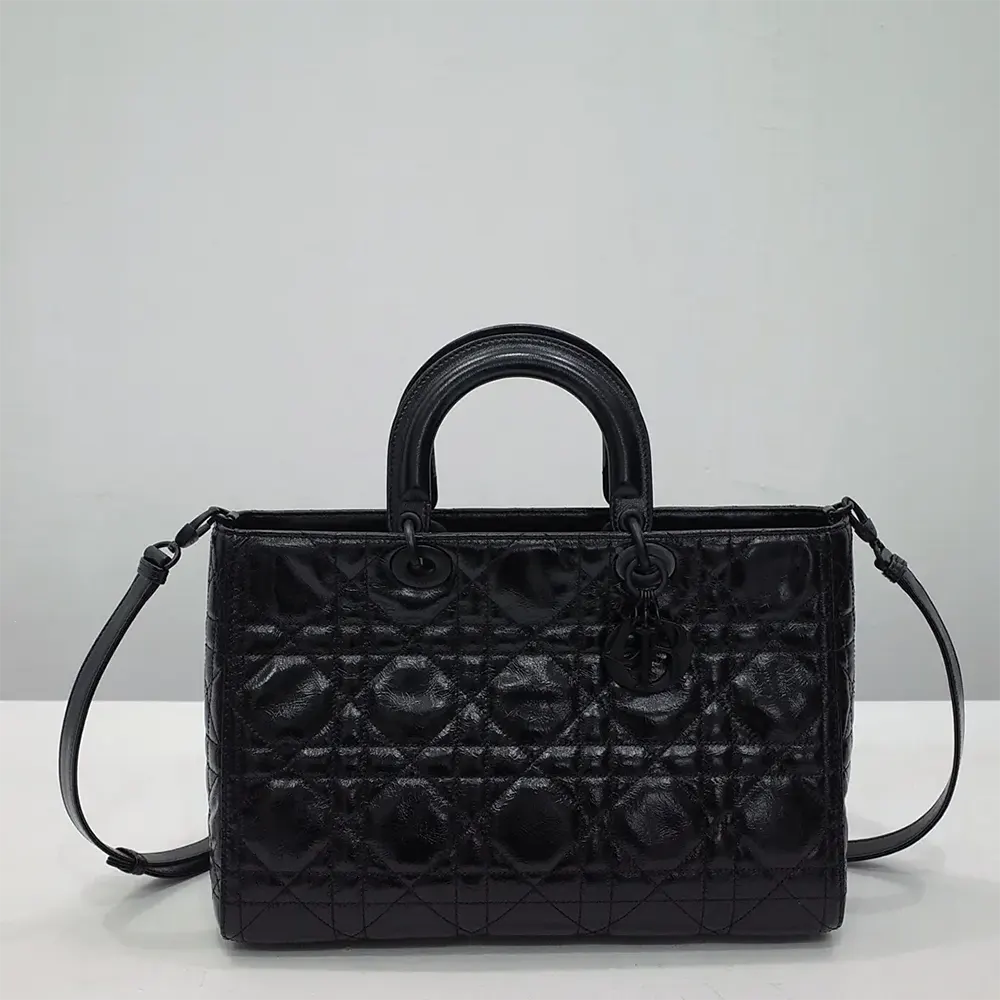 Close-up of signature Macrocannage pattern on Dior Women Large Lady D-Sire Bag