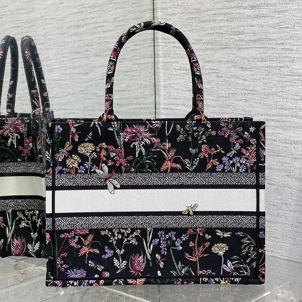 Side angle showing silver-tone hardware on Dior Women Medium Dior Book Tote