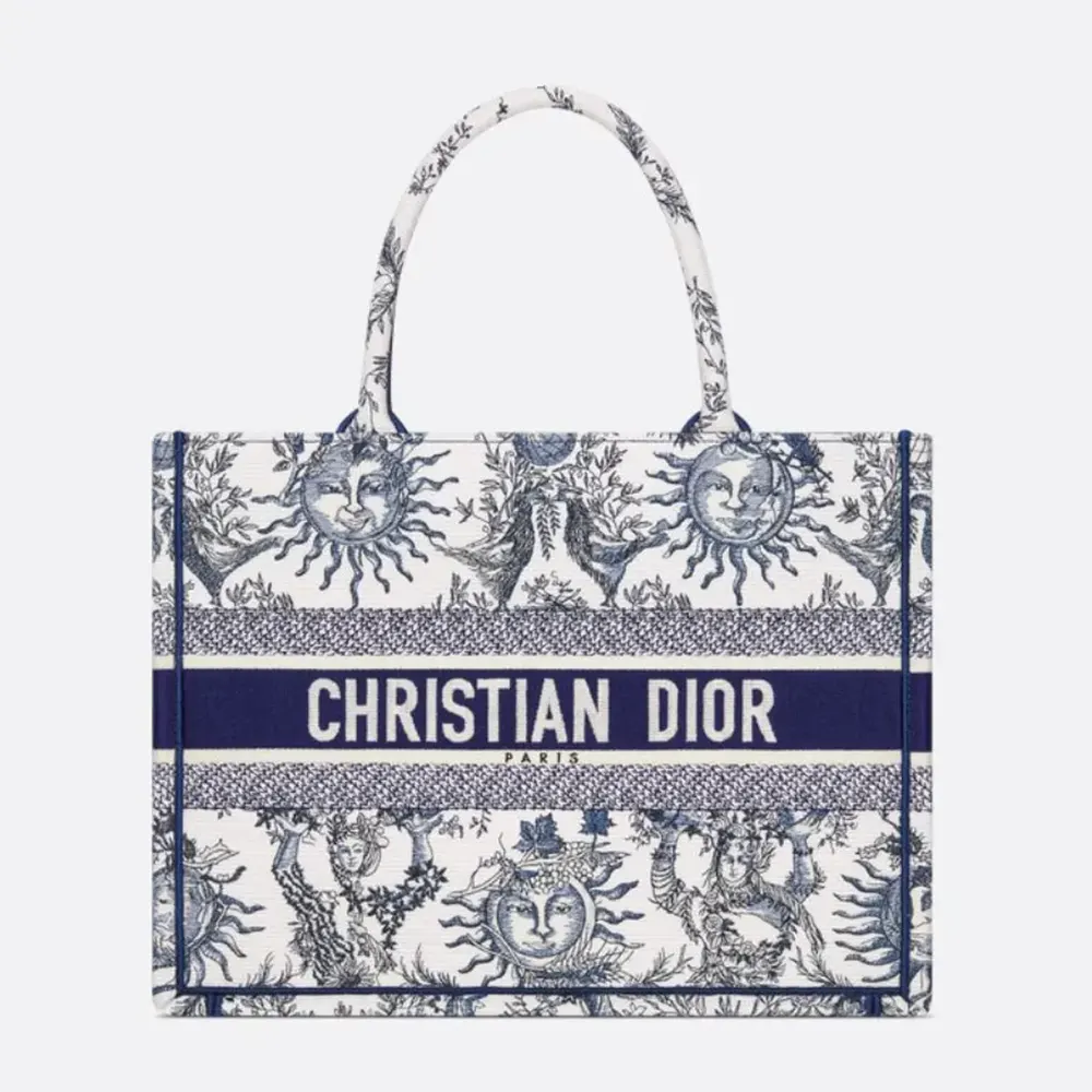 Front view of Dior Women Medium Dior Book Tote White and Navy Blue Toile de Jouy Soleil Embroidery