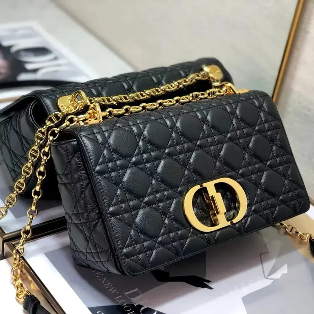 Close-up of black cannage stitching and silver hardware on Dior Caro Bag