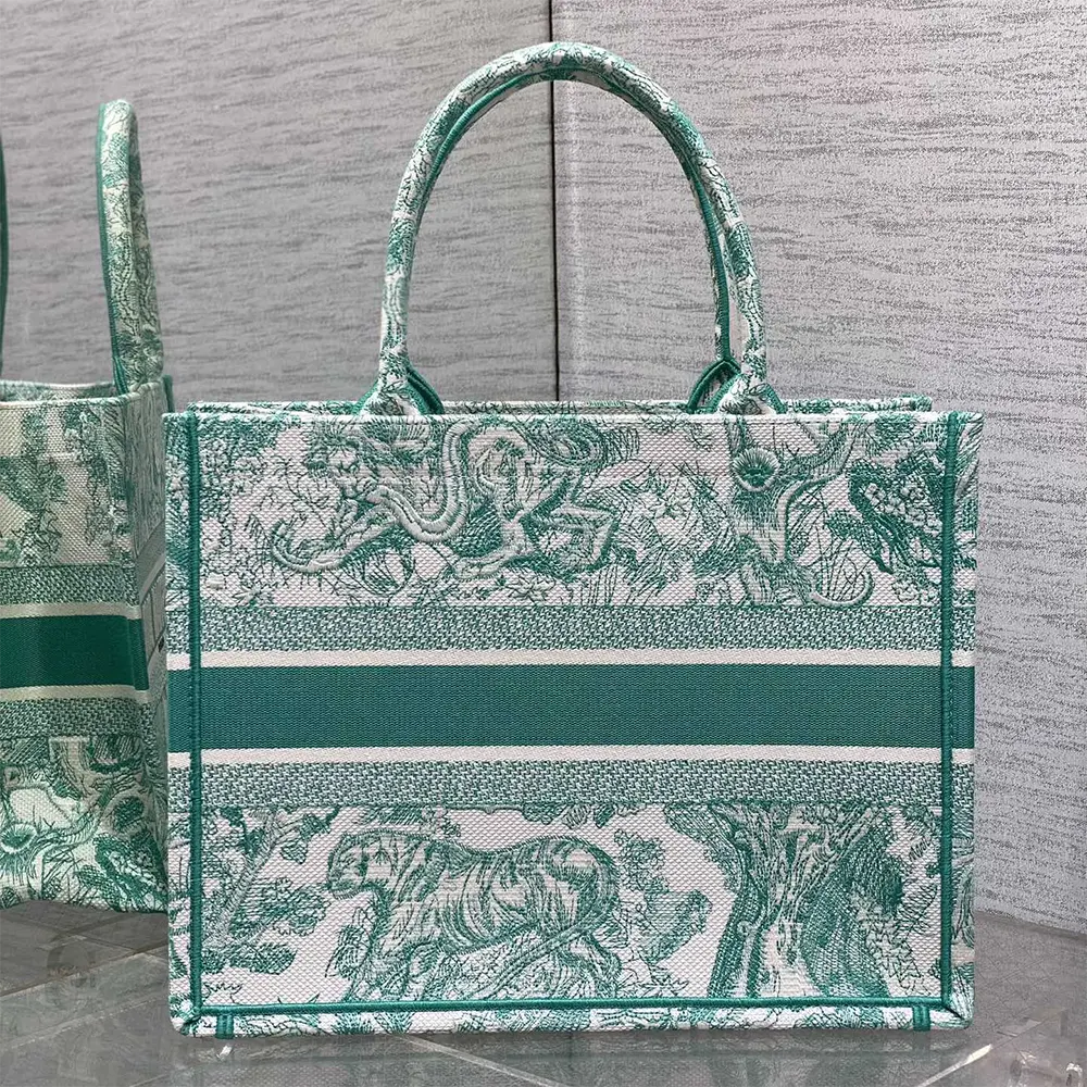 Side angle showing silver-tone hardware on Dior Women Medium Dioriviera Dior Book Tote