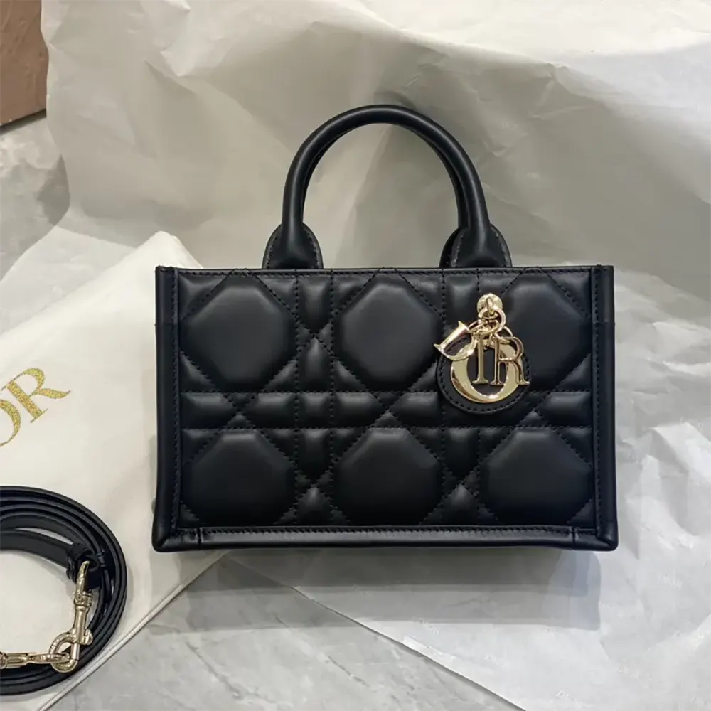 Close-up of black calfskin and Macrocannage quilting on Dior Women Mini Dior Book Tote