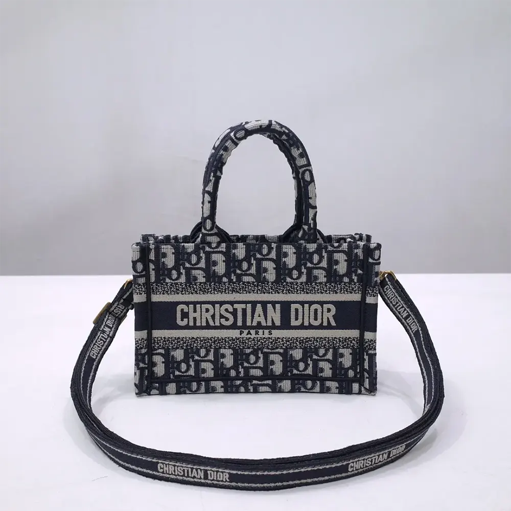 Close-up on signature blue Dior Oblique embroidery detail