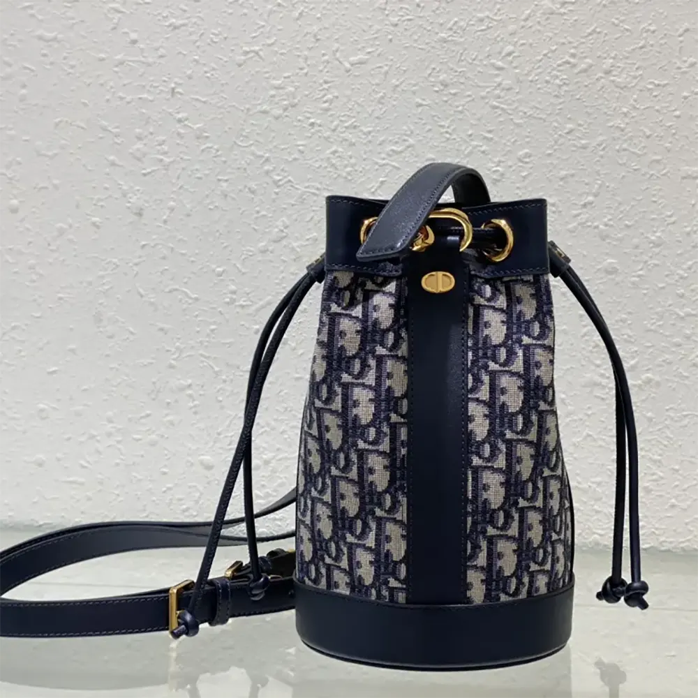 Close-up of blue Dior Oblique jacquard pattern on small backpack