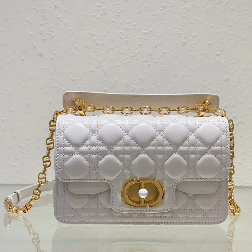 Close-up of latte cannage calfskin stitching and silver hardware on Dior Jolie bag