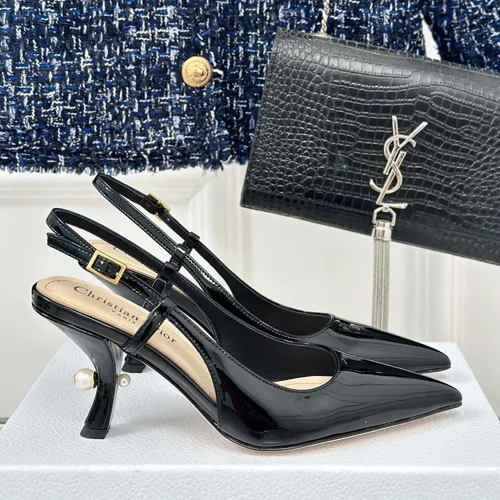 Close-up of signature Dior disc hardware on the Tribales Slingback Pump