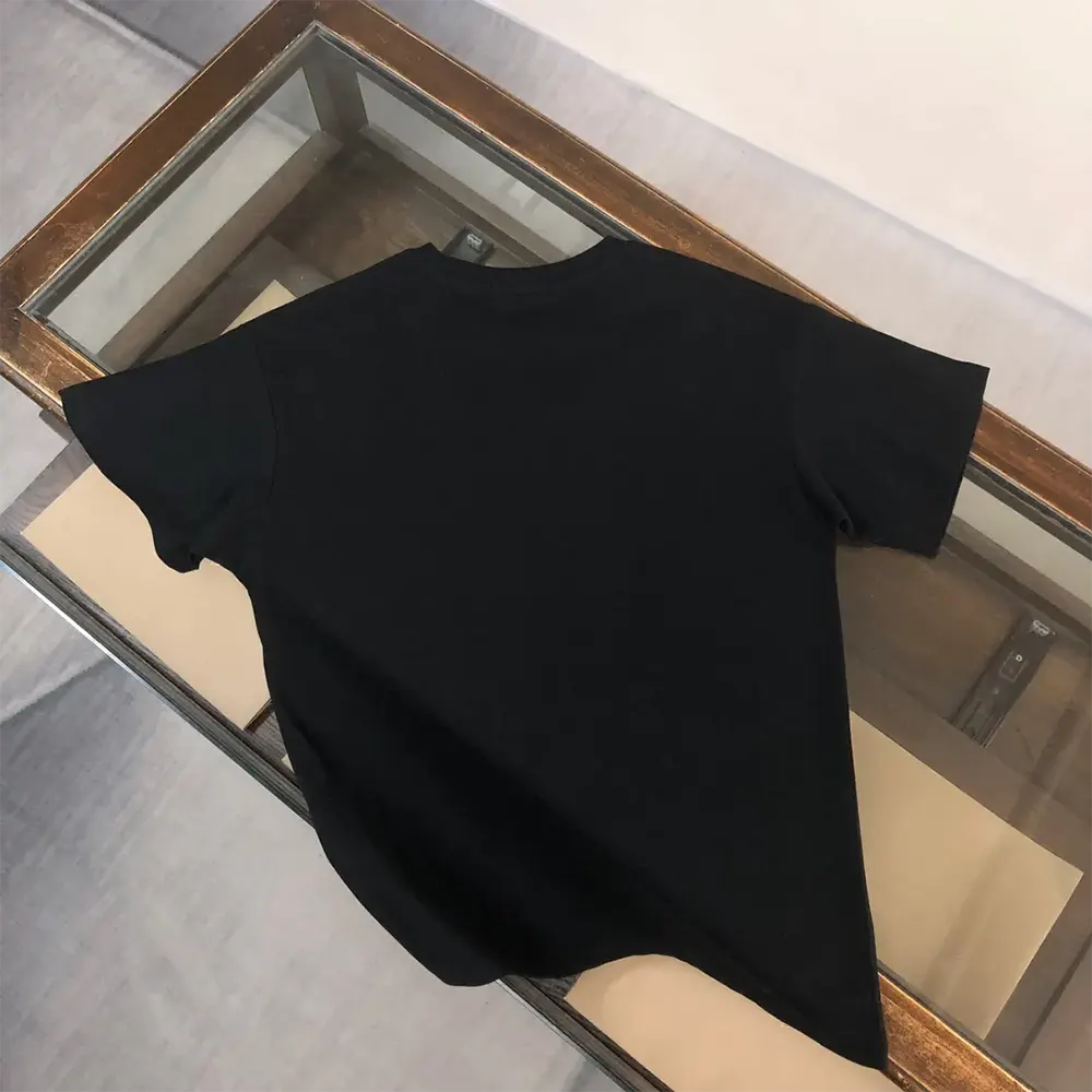 Side angle showcasing fit of Dolce Gabbana D&G Men Short-sleeved Marina-print T-shirt