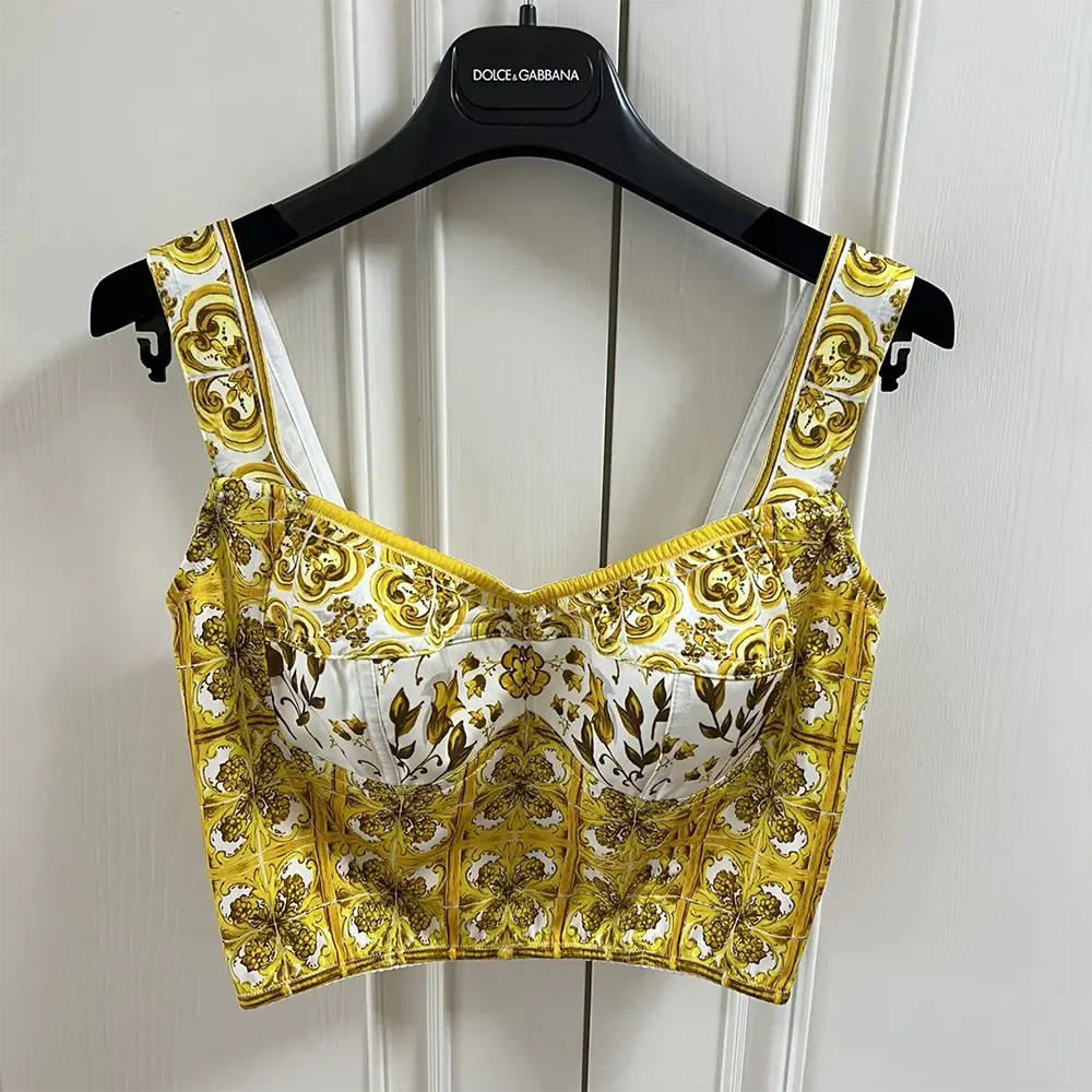 Close-up of yellow Majolica print on Dolce Gabbana D&G corset top