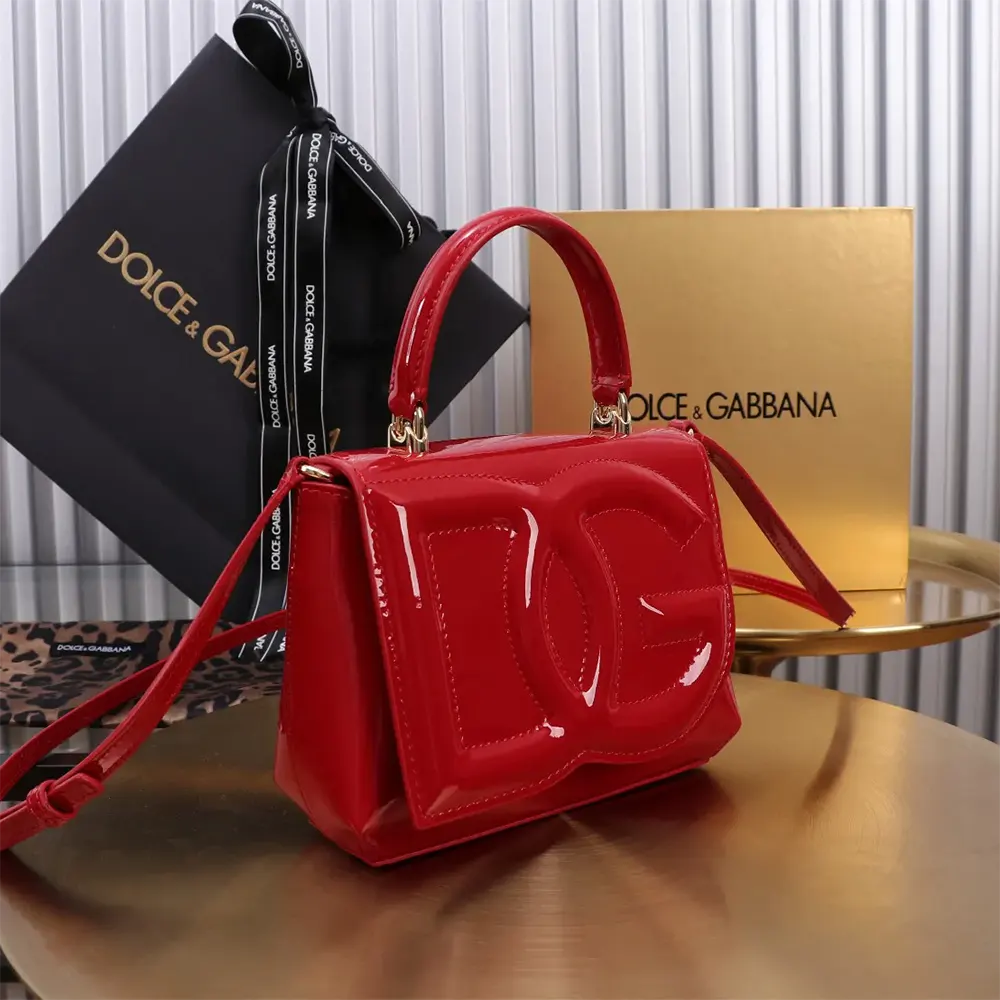 Side angle showing compact silhouette of Dolce Gabbana D&G Top-handle Bag