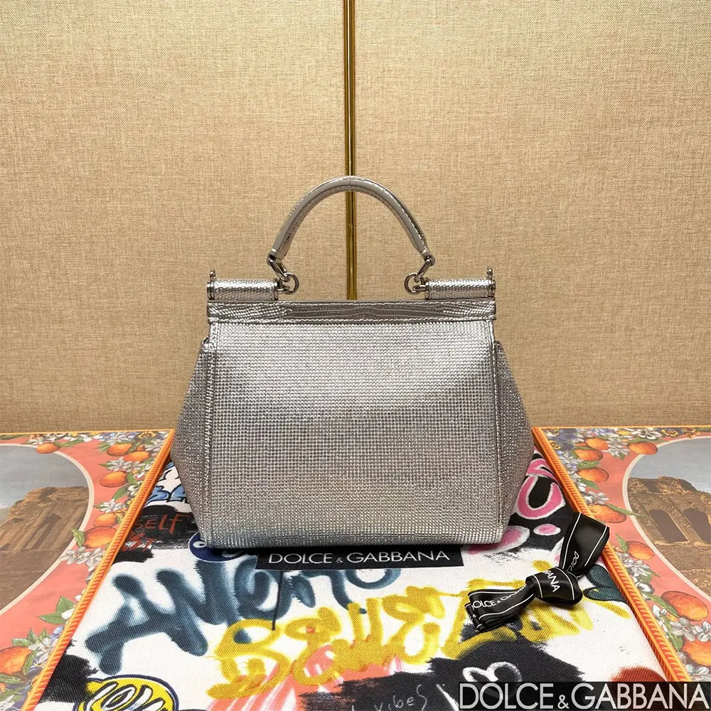 Side profile showing structured silhouette of Dolce Gabbana D&G Women KIM DOLCE&GABBANA Medium Sicily Handbag