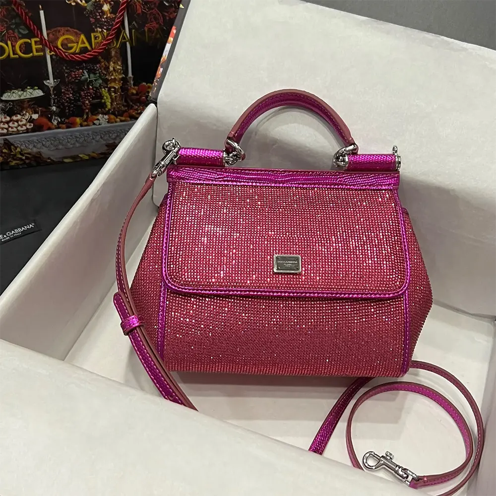 Side profile showing silhouette and strap of Dolce Gabbana D&G Mini Sicily handbag